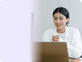 DermClick dermatologist reviewing a formula on a laptop